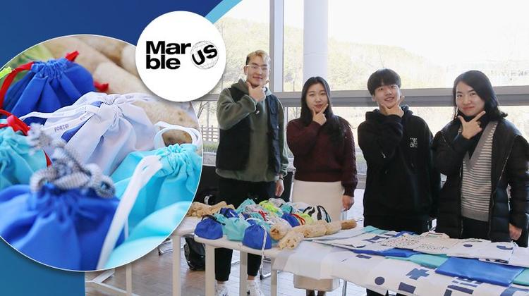 Team 'Marble US' Finds New Life for Used Event Banners!